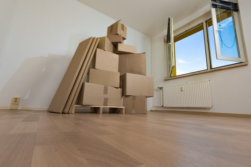 Removal crew loading items from a flat in Shepherds Bush