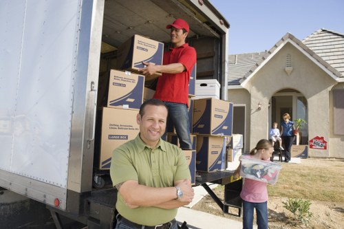 Van team preparing equipment and safety checks before a move