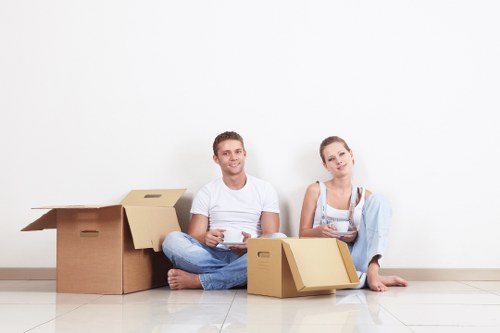 Packing boxes and student belongings prepared for a local move in Shepherds Bush