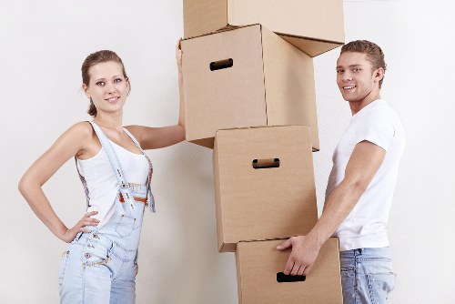 Professional man with van loading items in West London