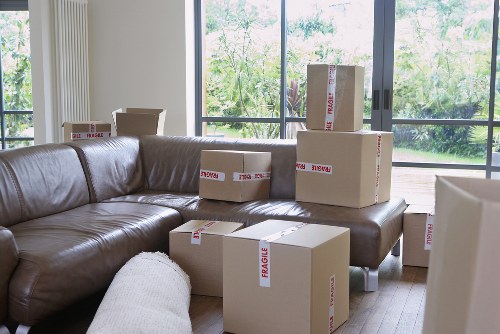 Unpacking household items in a West London property