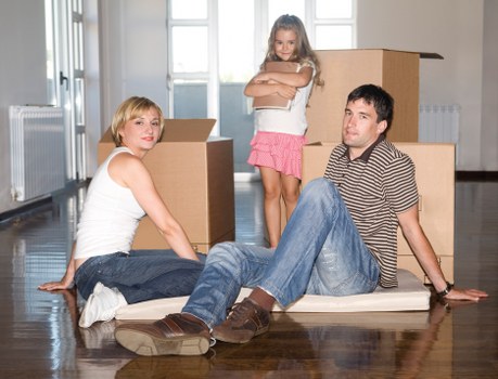 Careful handling of furniture in a Shepherds Bush flat